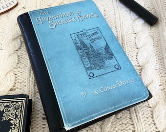 Cartera con tapa para el libro Las aventuras de Sherlock Holmes