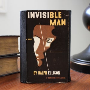 Cartera de mano de piel sintética con tapa de libro de Ellison Invisible Man