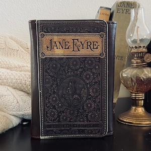 Cartera plegable de piel sintética con forma de libro de Jane Eyre
