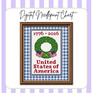 May include: A framed digital needlepoint chart featuring a patriotic design. The artwork includes a green wreath, American flags, and the text "1776-2026" and "United States of America" in red. The frame has a brown finish and a blue and white gingham background.