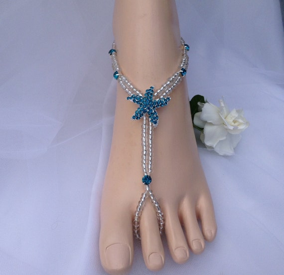 Sandales aux pieds nus bleu sarcelle d'étoile de mer avec des