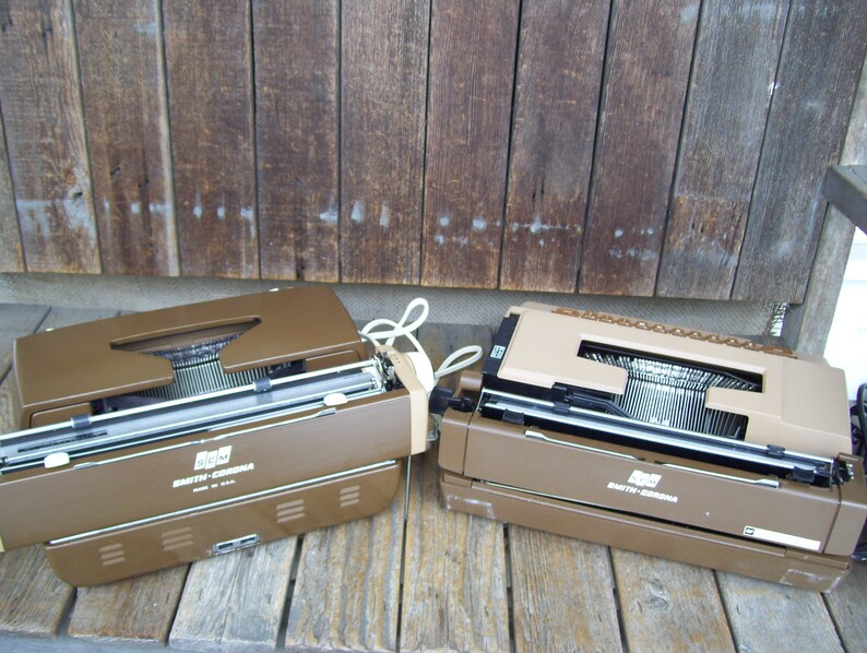 Smith Coronet Electric Typewriter Automatic 12 Wood Grain Or Smith Corona Sterling Cartridge Portable Typewriter Tan Brown Both Have Cases