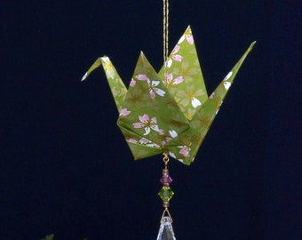 Origami Crane Suncatcher - large - green paper w/ flowers, peace crane, 1st yr anniversary varnished, gold string Swarovski crystals