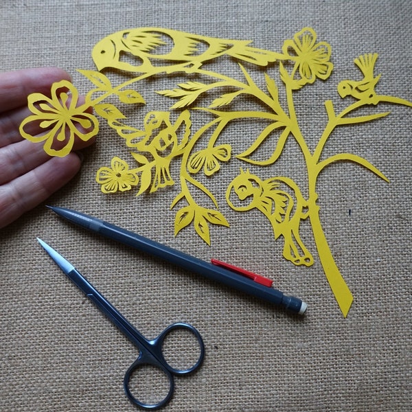 Papercut art bird picture of paper Original paper cut out art. Yellow paper cutting decor