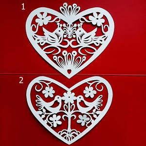 Heart shaped paper cutout picture.
