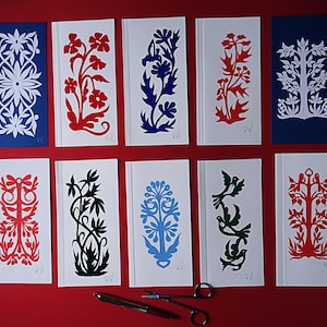 Handpapier geschnittene Kunstkarten. Original Papierschnitt. Grußkarten aus Papierschliff.