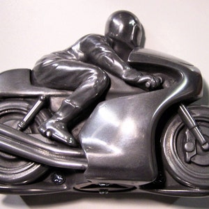 Biker wall mounted bottle opener