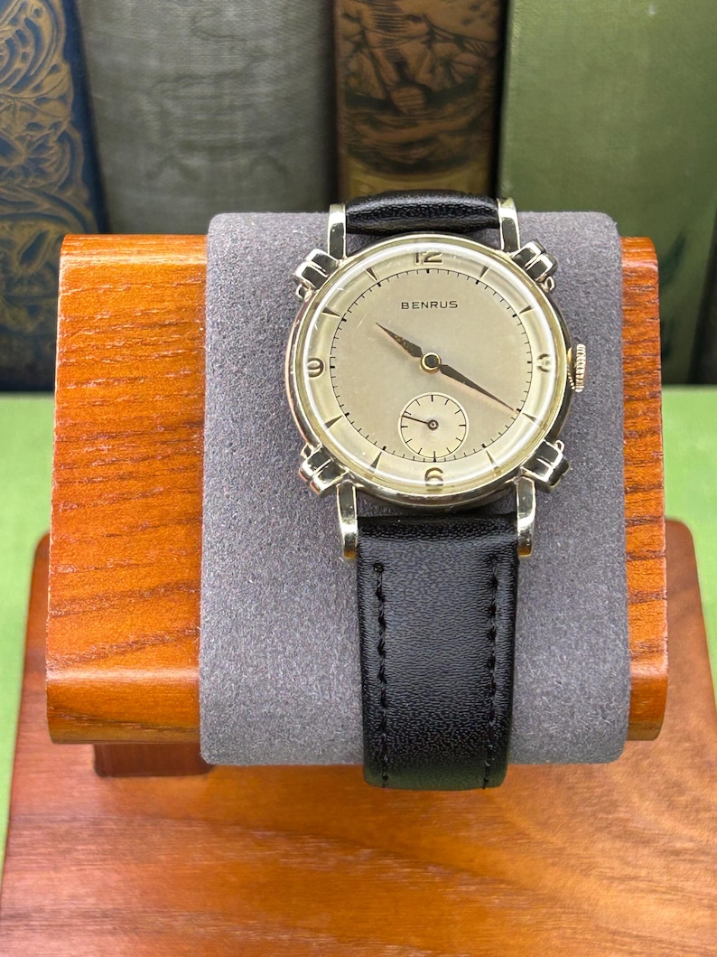 Vintage Benrus swiss watch with gold plated case and small seconds patina dial. New black leather band. Running, serviced, keeps time, working.