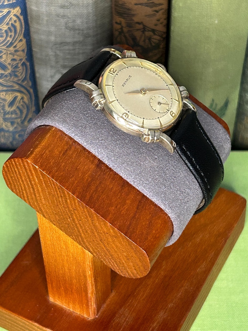 Vintage Benrus swiss watch with gold plated case and small seconds patina dial. New black leather band. Running, serviced, keeps time, working.