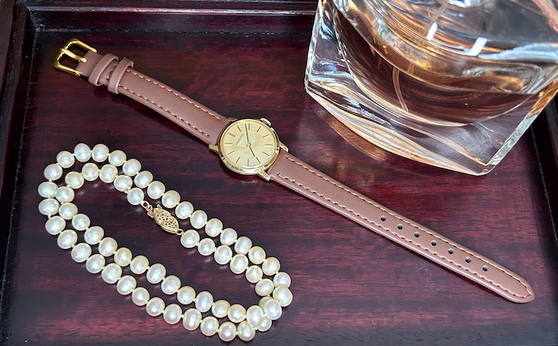 Vintage Longines ladies watch with gold plated case and gold dial. Mechanical  movement. Running, serviced, keeps time, working
