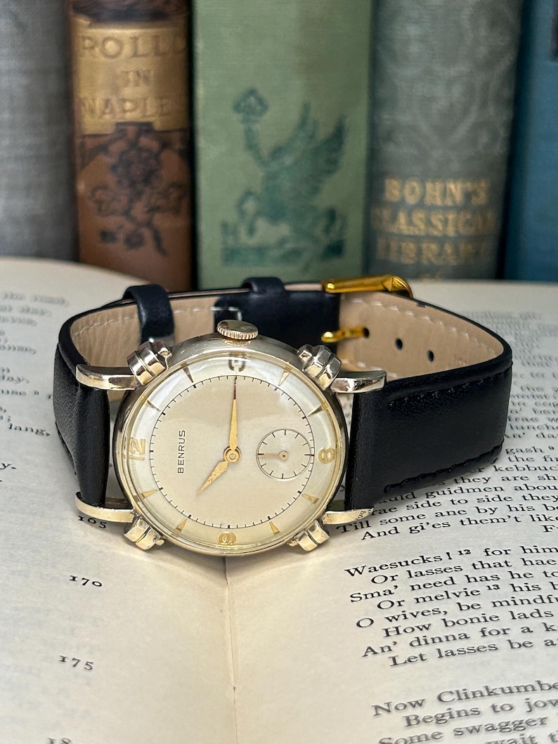 Vintage Benrus swiss watch with gold plated case and small seconds patina dial. New black leather band. Running, serviced, keeps time, working.