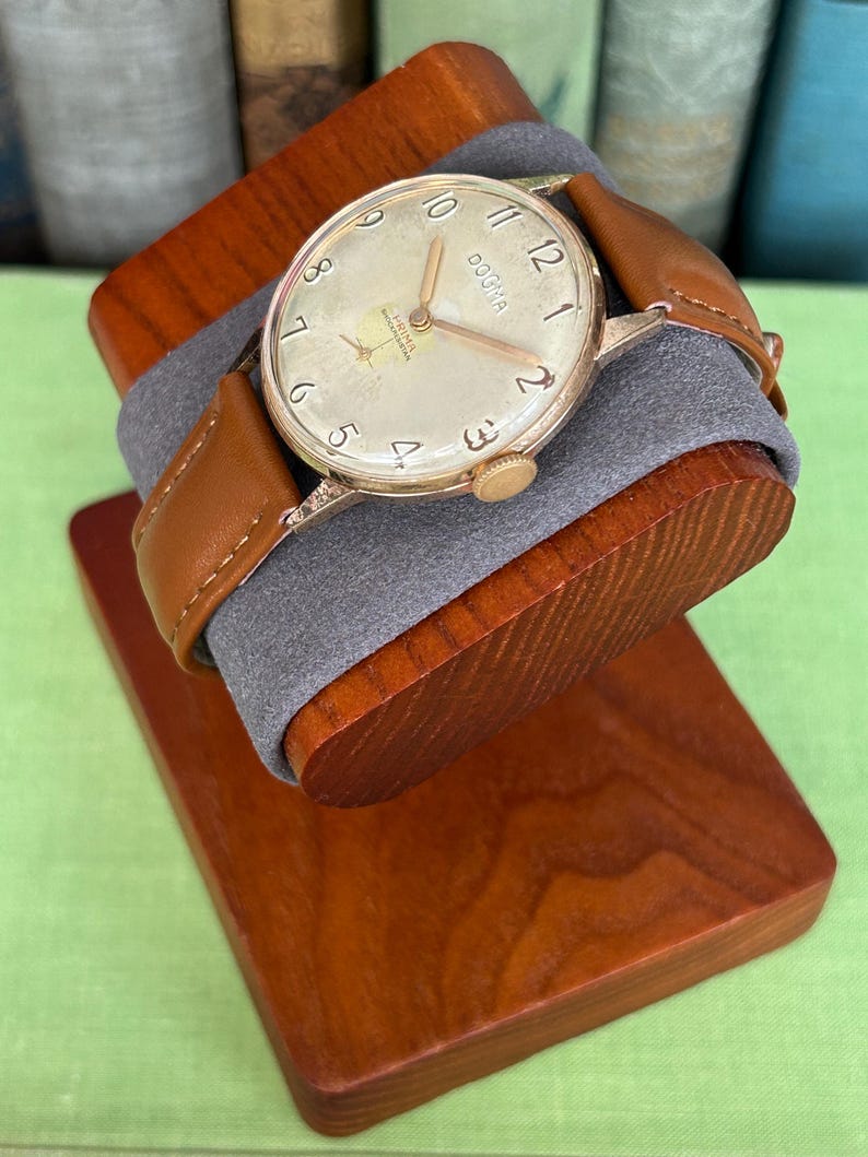 Vintage watch Dogma Prima jumbo swiss watch with rose gold plated case and small seconds dial.  New brown leather band. Running, serviced, keeps time, working.