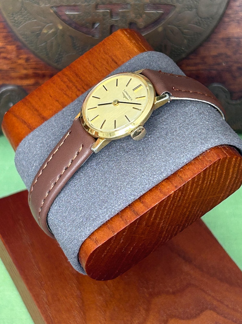 Vintage Longines ladies watch with gold plated case and gold dial. Mechanical  movement. Running, serviced, keeps time, working
