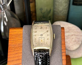 Vintage 1950's Longines Watch. Serviced and keeping time. Ready to wear! Beautiful patina dial.