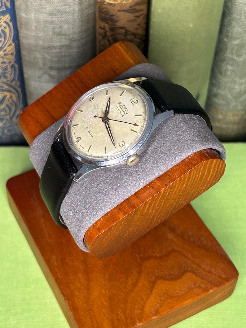 Vintage Roamer Popular watch.  black leather band.  Running, serviced working.    Silver color case.