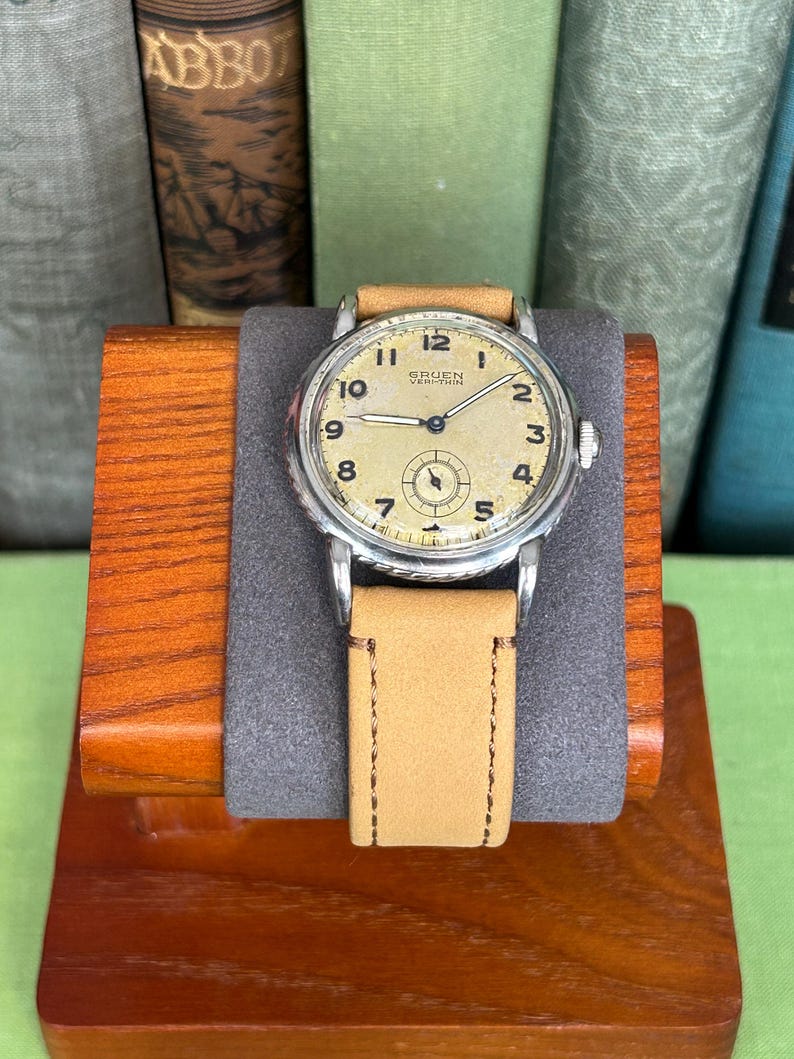 Vintage 1950s Gruen Veri-Thin Submarine Stainless Steel watch and small seconds patina dial. brown leather band.  Running, serviced, keeps time, working.