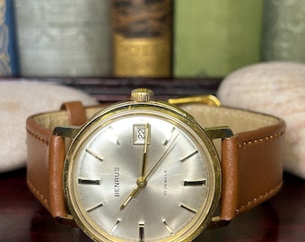 Vintage Benrus watch with date and display back. Serviced, Running and keeping time! Ready to wear!