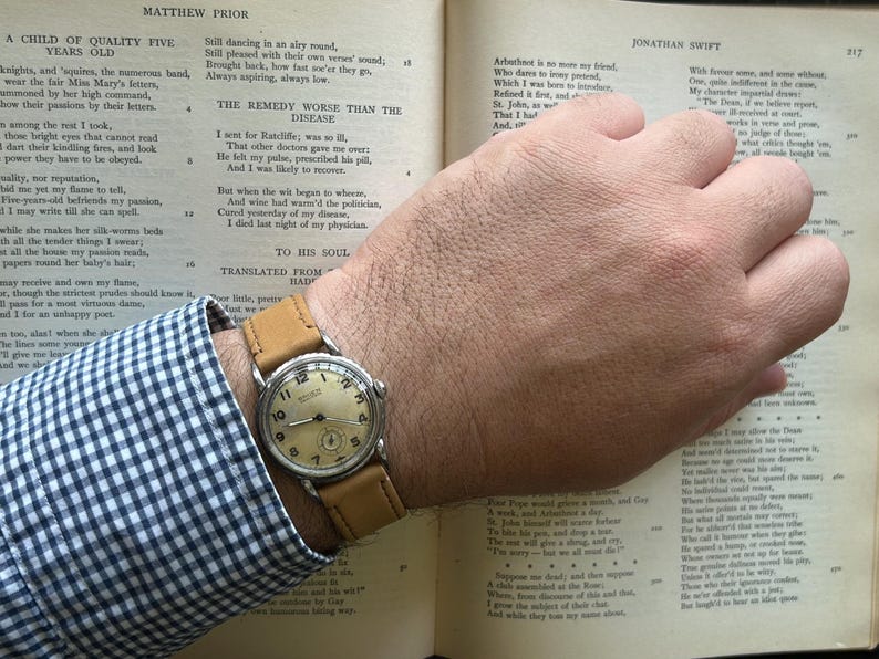 Vintage 1950s Gruen Veri-Thin Submarine Stainless Steel watch and small seconds patina dial. brown leather band.  Running, serviced, keeps time, working.