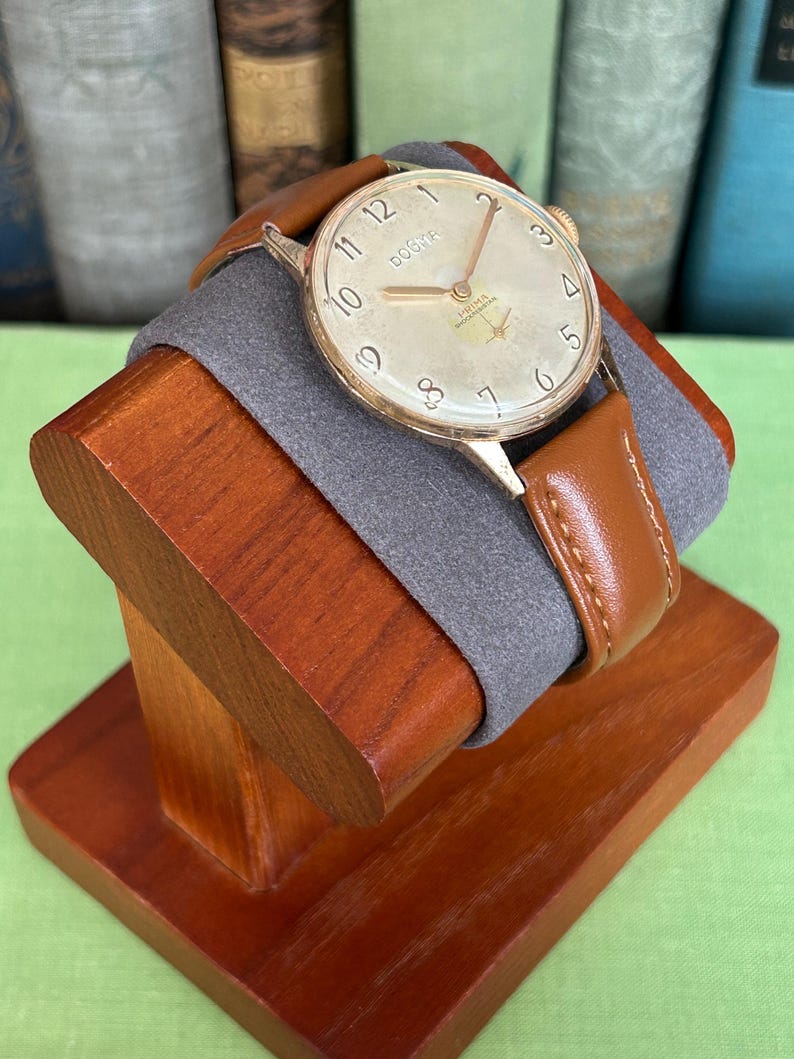 Vintage watch Dogma Prima jumbo swiss watch with rose gold plated case and small seconds dial.  New brown leather band. Running, serviced, keeps time, working.