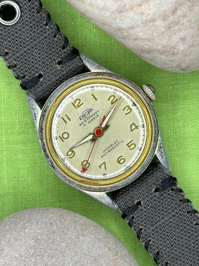 Vintage 1950s Enicar swiss watch with aluminum plated case and red sweep seconds dial. New grey canvas band. Running, serviced, keeps time, working.