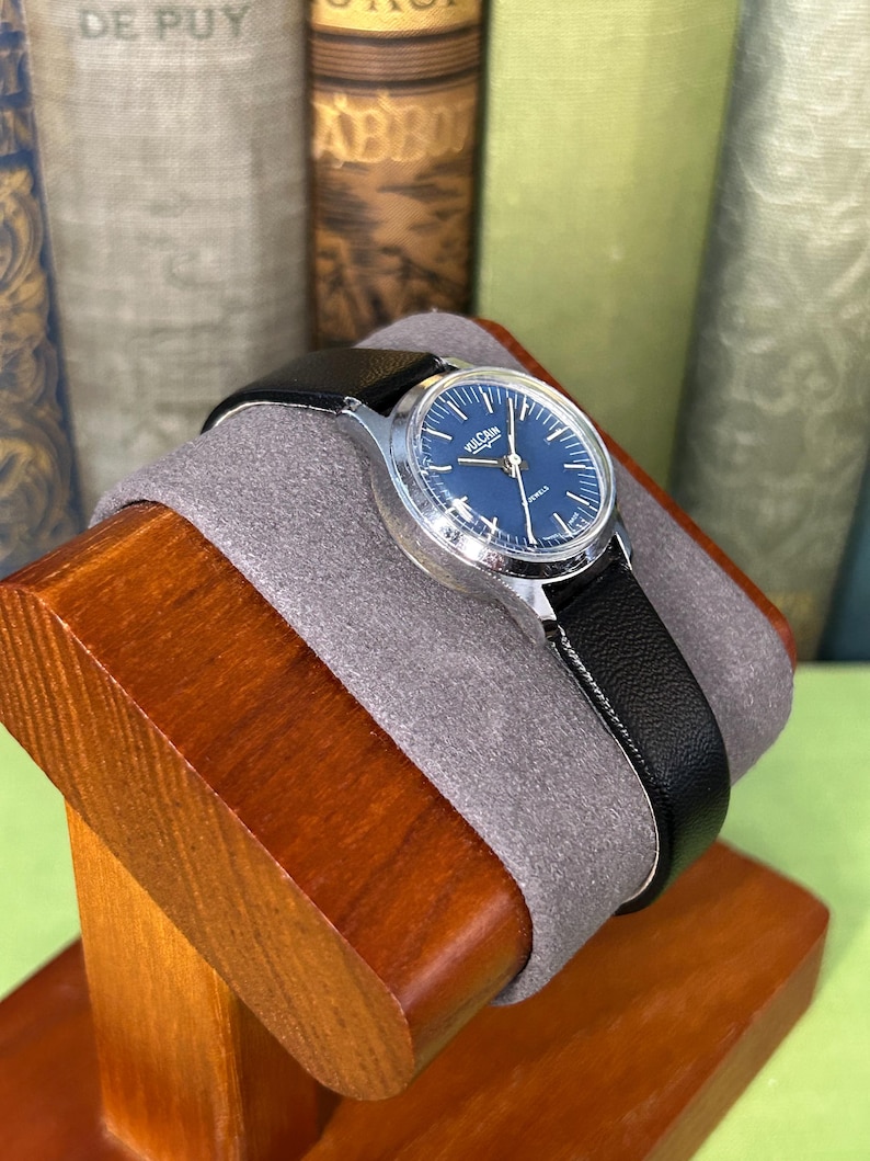 Vintage Vulcain Lady's watch with silver color case and black leather strap.  Serviced and running.  Keeps time. Working. Blue Dial