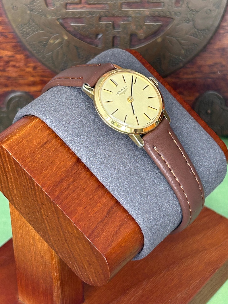 Vintage Longines ladies watch with gold plated case and gold dial. Mechanical  movement. Running, serviced, keeps time, working