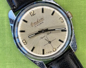 Vintage 1960's Omikron Super Shock watch. Serviced, Running and working.  Ready to wear!