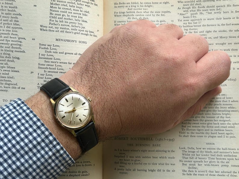Vintage 1970 Bulova Sea King swiss watch with gold plated case and sweep seconds dial. New black leather band. Running, serviced, keeps time, working.