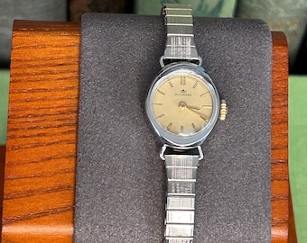 Vintage Bucherer Swiss Ladies watch.  Stainless Steel. Serviced and running! Keeps time.