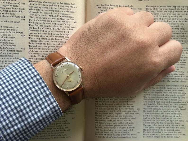 Vintage watch Dogma Prima jumbo swiss watch with rose gold plated case and small seconds dial.  New brown leather band. Running, serviced, keeps time, working.