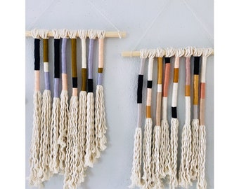 Yarn wrapped tapestries