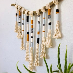 Yarn wrapped tassel wallhanging in cool neutrals image 2