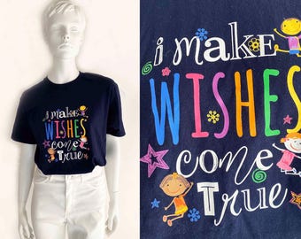 The Make Wishes Come True T Shirt Vintage 80s Navy Blue Cotton Tee Knit Top Shirt Graphic Logo Tee