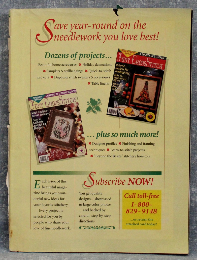 May include: An advertisement for "Just CrossStitch" magazine, showcasing two covers with cross-stitch designs. The ad highlights projects like home accessories and holiday decorations, and encourages subscriptions with a phone number.