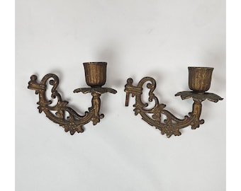 Par de brazos de aplique de piano vintage, soportes de pared de hierro fundido tono dorado para velas.