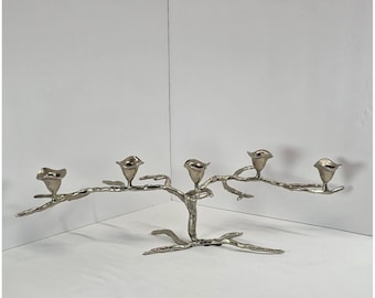 Candelabro vintage in alluminio pressofuso a 5 bracci, color argento.
