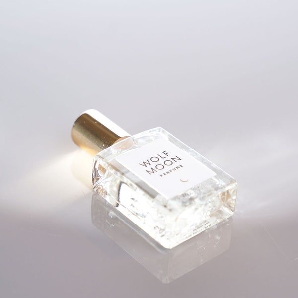 Wolf Moon™ Perfume Oil: Amber, Vanilla, Musk - Clear Quartz Crystal Infused