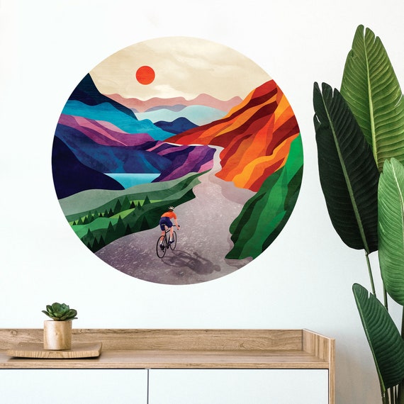 Cycling high in the mountains. Self-adhesive wall decal. Repositionable and removable fabric.