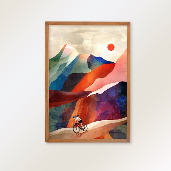 Woman cyclist fine art print. Fast gravel descender in the mountains.