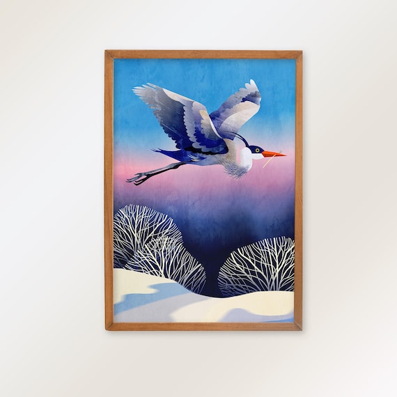 Heron fine art print. Magnificent bird flying over snow-covered country.