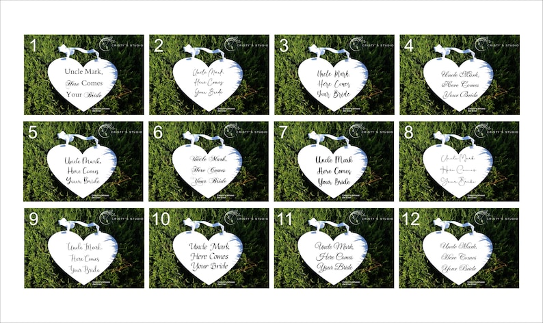 May include: Twelve white heart-shaped signs with black text that reads "Uncle Mark, Here Comes Your Bride". The signs are arranged in a grid of four rows and three columns. The signs are displayed on a green grassy background.