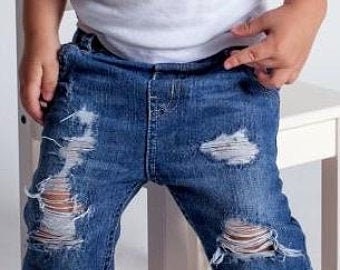 light blue jeans with holes
