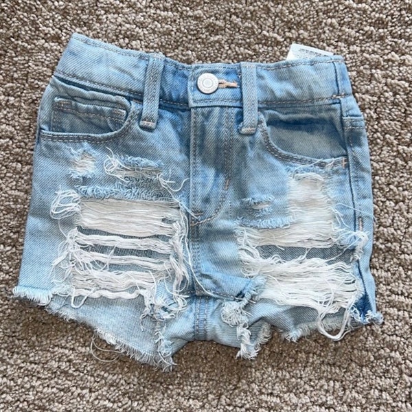 baby girl ripped denim shorts | toddler distressed jean shorts | holey shredded jean cutoff shorts | slashed denim shorts || THE RAYZER