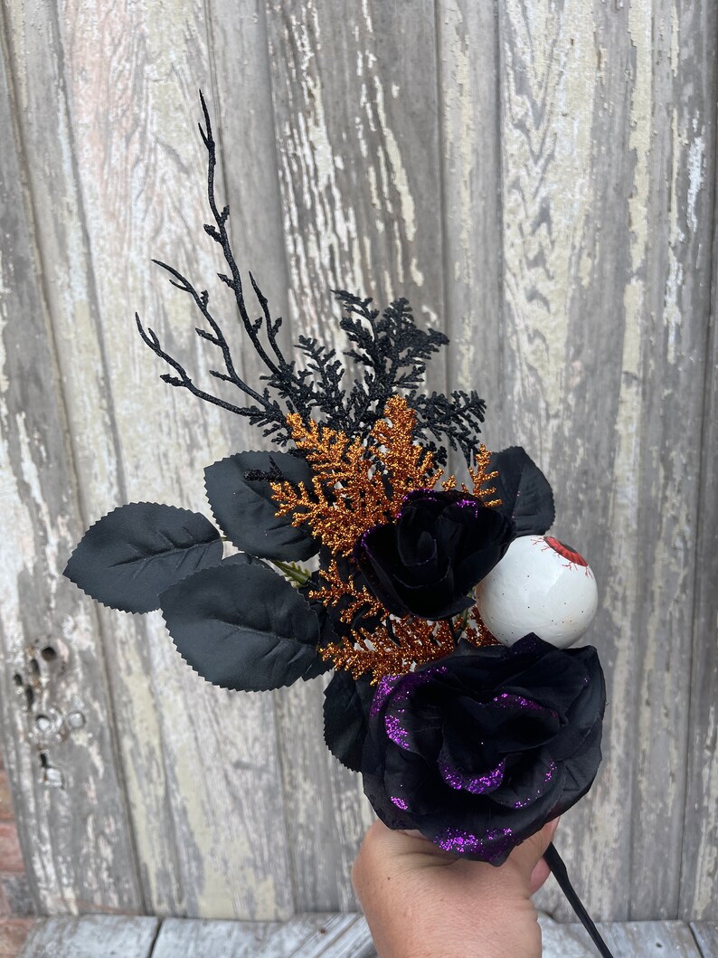 Halloween Eyeball in Rose floral Stem with twigs and orange cedar
