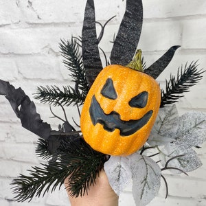 Jack-O- Lantern floral pick with grasses and black twigs
