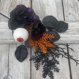 Halloween Eyeball in Rose floral Stem with twigs and orange cedar