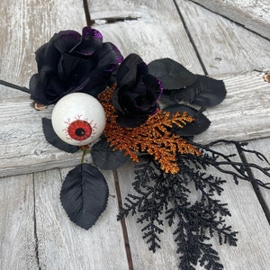 Halloween Eyeball in Rose floral Stem with twigs and orange cedar