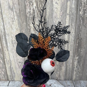Halloween Eyeball in Rose floral Stem with twigs and orange cedar