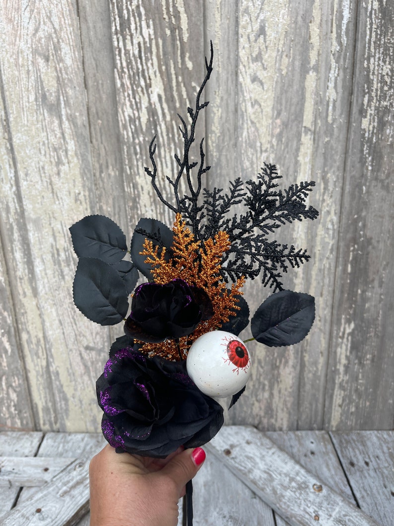 Halloween Eyeball in Rose floral Stem with twigs and orange cedar