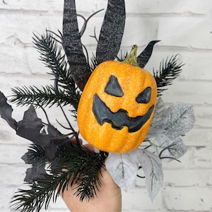 Jack-O- Lantern floral pick with grasses and black twigs